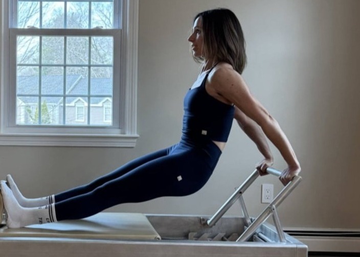 Pilates reformer equipment used for core strength training